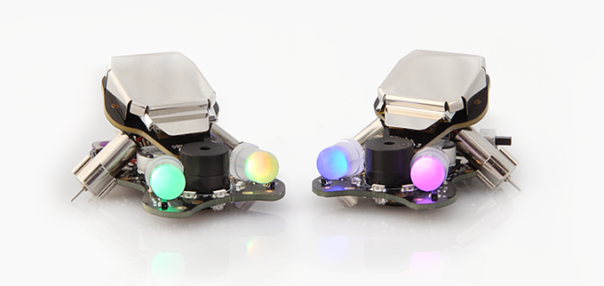 Two Winkbots with LEDs on